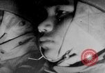 Standbild japanische Fallschirmjäger angreifenden Palembang in Niederländisch Ostindien Palembang Dutch East Indies, 1942, aus Sekunde 52 historischem Filmmaterial Videoclip 65675043483