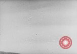 Standbild japanische Fallschirmjäger angreifenden Palembang in Niederländisch Ostindien Palembang Dutch East Indies, 1942, aus Sekunde 57 historischem Filmmaterial Videoclip 65675043483