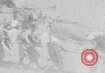 Standbild japanische Truppen Birma, 1940, aus Sekunde 28 historischem Filmmaterial Videoclip 65675043490
