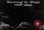 Image of natives in city Singapore, 1937, second 6 stock footage video 65675043495