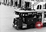 Image of natives in city Singapore, 1937, second 16 stock footage video 65675043495