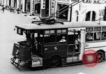 Image of natives in city Singapore, 1937, second 17 stock footage video 65675043495
