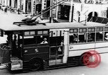 Image of natives in city Singapore, 1937, second 18 stock footage video 65675043495