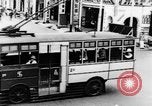 Image of natives in city Singapore, 1937, second 19 stock footage video 65675043495