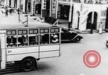 Image of natives in city Singapore, 1937, second 21 stock footage video 65675043495