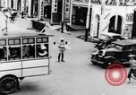 Image of natives in city Singapore, 1937, second 22 stock footage video 65675043495