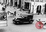 Image of natives in city Singapore, 1937, second 23 stock footage video 65675043495