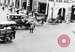 Image of natives in city Singapore, 1937, second 30 stock footage video 65675043495