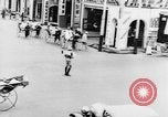 Image of natives in city Singapore, 1937, second 35 stock footage video 65675043495