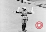 Image of natives in city Singapore, 1937, second 39 stock footage video 65675043495