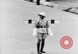 Image of natives in city Singapore, 1937, second 40 stock footage video 65675043495