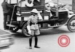 Image of natives in city Singapore, 1937, second 41 stock footage video 65675043495