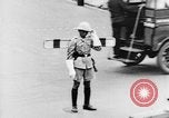 Image of natives in city Singapore, 1937, second 42 stock footage video 65675043495