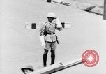 Image of natives in city Singapore, 1937, second 44 stock footage video 65675043495