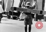 Image of natives in city Singapore, 1937, second 46 stock footage video 65675043495