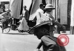 Image of natives in city Singapore, 1937, second 48 stock footage video 65675043495