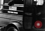 Image of natives in city Singapore, 1937, second 52 stock footage video 65675043495