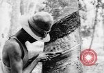 Image of natives in city Singapore, 1937, second 57 stock footage video 65675043495