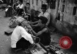Immagine di Cambogiano di dentista Phnom Penh Cambogia, 1957, secondo 6 filmato di repertorio 65675043581
