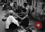 Immagine di Cambogiano di dentista Phnom Penh Cambogia, 1957, secondo 12 filmato di repertorio 65675043581