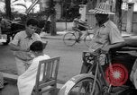 Image Street scene Phnom Penh Cambodge, 1957, de la seconde 8 séquences d'archives historiques vidéo 65675043582