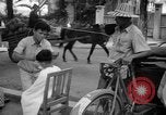 Image Street scene Phnom Penh Cambodge, 1957, de la seconde 9 séquences d'archives historiques vidéo 65675043582