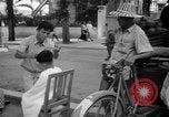 Image Street scene Phnom Penh Cambodge, 1957, de la seconde 11 séquences d'archives historiques vidéo 65675043582