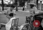 Image Street scene Phnom Penh Cambodge, 1957, de la seconde 12 séquences d'archives historiques vidéo 65675043582