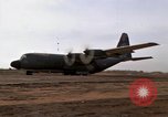Image C-130 Hercules Vietnam Dak à, 1970, de la seconde 26 séquences d'archives historiques vidéo 65675043599