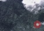 Image of C-130 Hercules drops BLU-82 bomb in Vietnam War Vietnam, 1970, second 13 stock footage video 65675043601