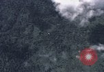 Image of C-130 Hercules drops BLU-82 bomb in Vietnam War Vietnam, 1970, second 14 stock footage video 65675043601