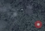 Image of C-130 Hercules drops BLU-82 bomb in Vietnam War Vietnam, 1970, second 19 stock footage video 65675043601
