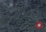 Image of C-130 Hercules drops BLU-82 bomb in Vietnam War Vietnam, 1970, second 21 stock footage video 65675043601