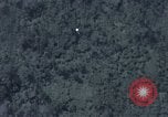 Image of C-130 Hercules drops BLU-82 bomb in Vietnam War Vietnam, 1970, second 22 stock footage video 65675043601