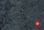 Image of C-130 Hercules drops BLU-82 bomb in Vietnam War Vietnam, 1970, second 27 stock footage video 65675043601