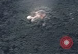 Image of C-130 Hercules drops BLU-82 bomb in Vietnam War Vietnam, 1970, second 30 stock footage video 65675043601