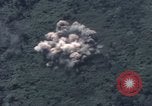 Image of C-130 Hercules drops BLU-82 bomb in Vietnam War Vietnam, 1970, second 33 stock footage video 65675043601