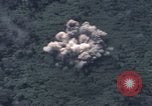 Image of C-130 Hercules drops BLU-82 bomb in Vietnam War Vietnam, 1970, second 34 stock footage video 65675043601