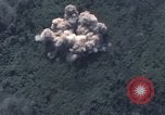 Image of C-130 Hercules drops BLU-82 bomb in Vietnam War Vietnam, 1970, second 36 stock footage video 65675043601