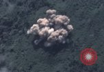 Image of C-130 Hercules drops BLU-82 bomb in Vietnam War Vietnam, 1970, second 39 stock footage video 65675043601