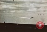 Image of USS Saratoga CV-3 struck by Kamikaze aircraft Pacific Theater, 1945, second 8 stock footage video 65675043694