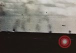 Image of USS Saratoga CV-3 struck by Kamikaze aircraft Pacific Theater, 1945, second 9 stock footage video 65675043694