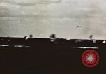 Image of USS Saratoga CV-3 struck by Kamikaze aircraft Pacific Theater, 1945, second 11 stock footage video 65675043694