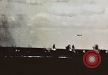 Image of USS Saratoga CV-3 struck by Kamikaze aircraft Pacific Theater, 1945, second 12 stock footage video 65675043694