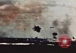 Image of USS Saratoga CV-3 struck by Kamikaze aircraft Pacific Theater, 1945, second 14 stock footage video 65675043694