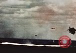 Image of USS Saratoga CV-3 struck by Kamikaze aircraft Pacific Theater, 1945, second 15 stock footage video 65675043694