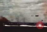 Image of USS Saratoga CV-3 struck by Kamikaze aircraft Pacific Theater, 1945, second 16 stock footage video 65675043694