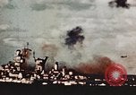 Image of USS Saratoga CV-3 struck by Kamikaze aircraft Pacific Theater, 1945, second 17 stock footage video 65675043694