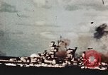 Image of USS Saratoga CV-3 struck by Kamikaze aircraft Pacific Theater, 1945, second 18 stock footage video 65675043694