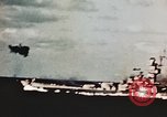Image of USS Saratoga CV-3 struck by Kamikaze aircraft Pacific Theater, 1945, second 19 stock footage video 65675043694